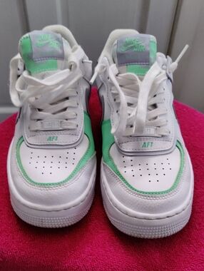 Nike Kids White Sneakers with Mint Green Accents